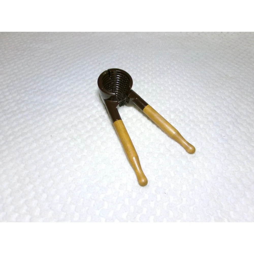 Vintage Spring Loaded Nutcracker‎ Brown Metal with Wood Handles Conical Design
